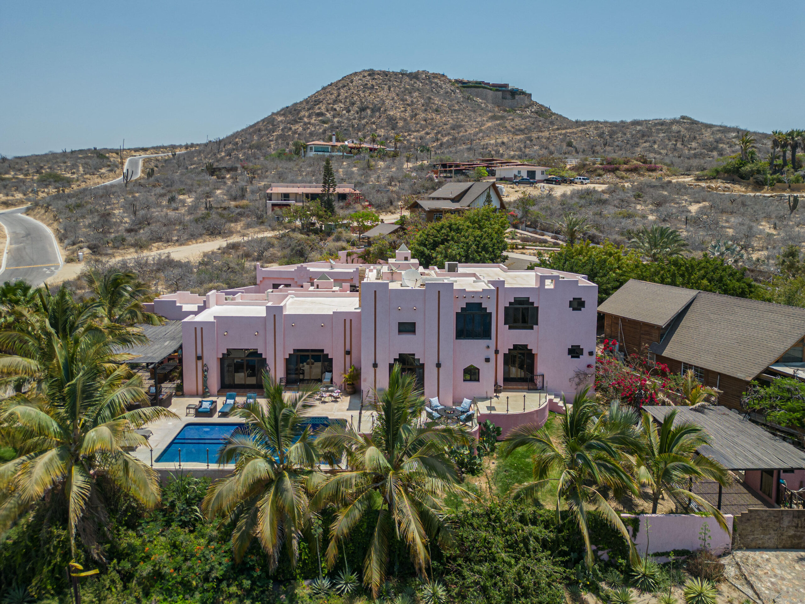 Quivira Migaloo Discover this charming villa inspired by Aztec architecture, ideally located within the prestigious Pueblo Bonito community. The home features an open and spacious layout with impressive cathedral ceilings, creating a bright and airy atmosphere throughout.The main residence offers three generously sized bedrooms, including a stunning primary suite complemented by a private loft--perfect for a reading area, office, or lounge.In addition to the main home, the property includes two detached casitas, each with its own ensuite bathroom, providing comfort and privacy for guests or extended family. Altogether, the estate offers five bedrooms, making it ideal as a private family compound or luxury vacation retreat.Step outside to enjoy a large swimming pool Surrounded by beautifully matured gardens, creating a serene and lush outdoor oasis perfect for relaxing or entertaining.Conveniently located with easy access to restaurants, bars, golf courses, beaches, and downtown Cabo San Lucas, this exceptional property combines privacy, charm, and prime location. for sale