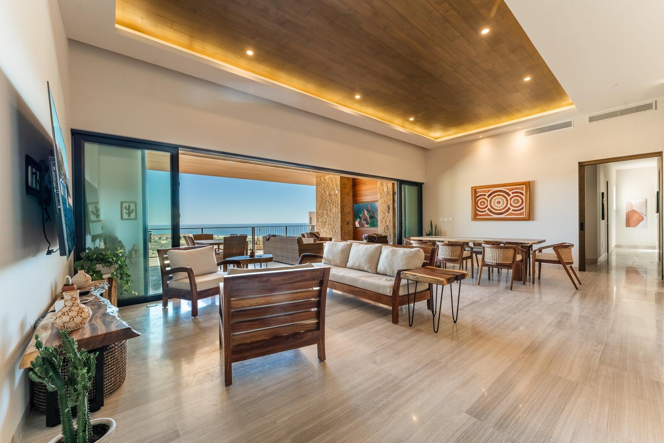 Quivira Copala Experience luxury coastal living in Copala at Quivira, one of Los Cabos' most sought-after communities. This elegant condo features an open-concept layout with a spacious living area, dining space, and fully equipped kitchen, all designed to take advantage of the panoramic Pacific Ocean for sale