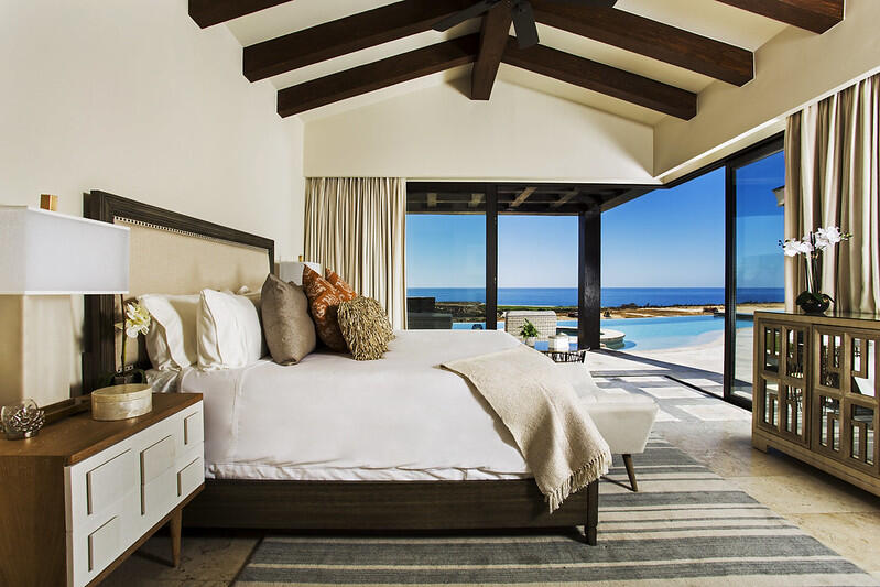 Quivira Coronado The Luna 5 bed home plan. The floor plan boasts a great room with vaulted ceilings over the living/dining area which looks out over the large covered terrace and the hand-made infinity edge pool beyond. The chefs kitchen with huge island with seating boasts Wolf and Sub-Zero appliances. The master and guest master have large ensuite baths w/ shower and tubs, and also both have ocean for sale