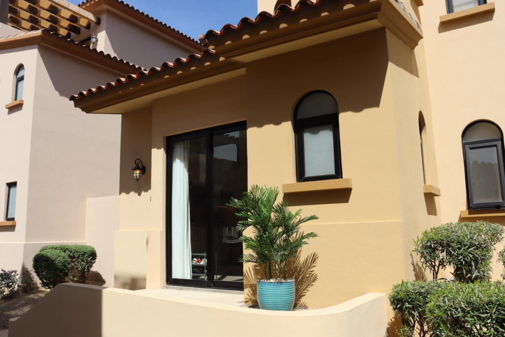 Quivira Mavila This studio apartment in the Pueblito section of Mavila at Quivira is the best entry level property in the exclusive gate golf community of Quivira Los Cabos. A charming single room suite with full en-suite and refined kitchenette complete with 4 burner induction range, stainless vent hood, microwave, and refrigerator with freezer. The large sliding front door opens onto a raised entrance platform facing west which receives nice afternoon sun allowing for a light airy feel. Openable windows in both the bath and bed area allow for more light and cross breeze to cool the unit. 1.5 ton inverter A/C efficiently cools the unit on even the hottest days. Fiber optic to the unit allows for high speed internet. Washer/dryer included as well as tanked electric water heater for immediate hot water use. Separate closet with drawers and shelves in addition to large utility closet for storing personal items. Studio owners at Mavila enjoy all the amenities afforded to Quivira real estate property owners including access to restaurants, spas, common areas, golf club, and beach club. Owners enjoy discounts on services: golf 25%, restaurants spas and hotels 20%. – Studio, Mavila at Quivira Pueblito, Pacific, Pacific, BS