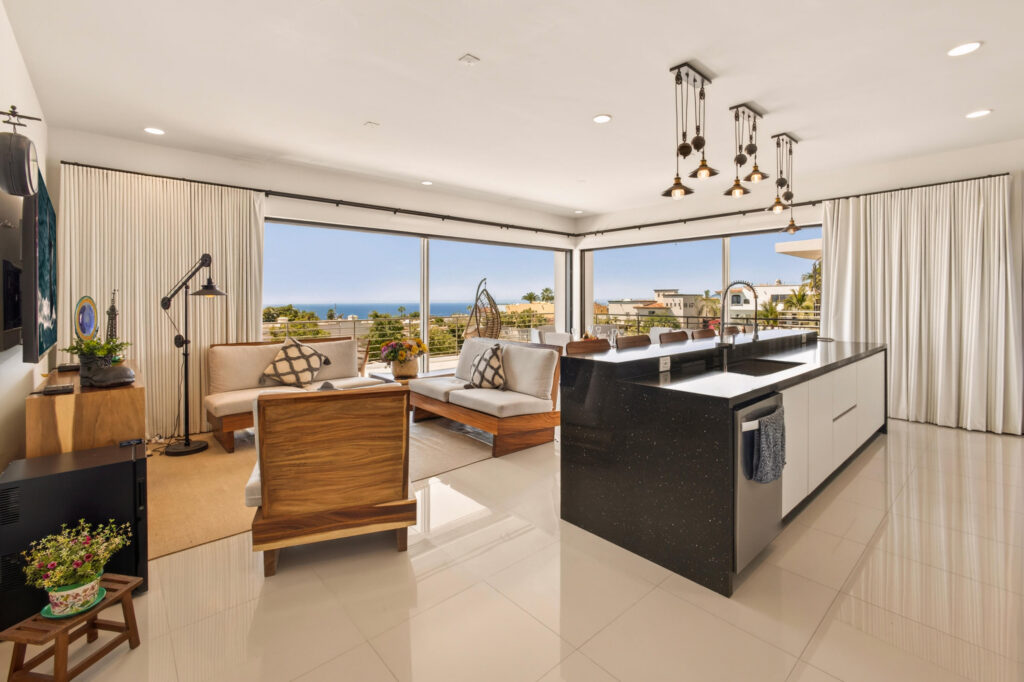Quivira Copala This beautifully designed condominium at Copala offers an exceptional layout that blends tranquility, sophistication, and functionality. Located on the ground floor of Tower 3, this 3-bedroom, 2.5-bath residence is ideal for full-time living, a second home, or hosting visiting family and friends. Two bedrooms open directly to the garden, just steps from a nearby swimming pool. The condo features an expansive open terrace, perfect for outdoor dining and lounge areas, enhancing seamless indoor-outdoor living. Owners enjoy exclusive access to the Copala Club House with movie theater, gym, deli, swimming pool, and infinity- – Copala at Quivira, Pacific, BS